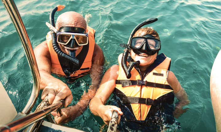 Senior couple scuba diving